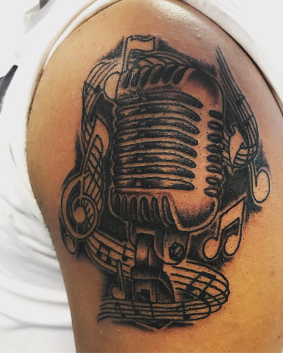 Explore lion king tattoo ideas, creative tattoo ideas in Muncie, available at The Tattoo Studio