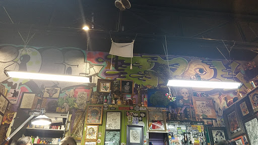 Explore lower back cover up tattoo ideas, creative tattoo ideas in Albuquerque, available at Por Vida Tattoo