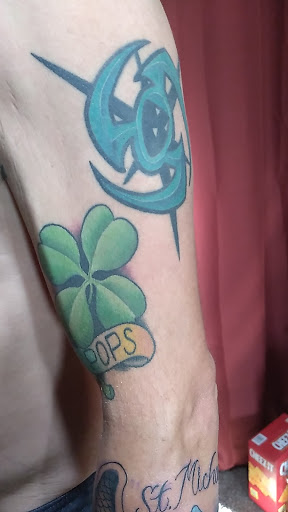 Explore titanic tattoo ideas, creative tattoo ideas in Cincinnati, available at Eighteen Tattoo