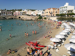 Photo de Spiaggia di Santa Maria al Bagno avec petite baie