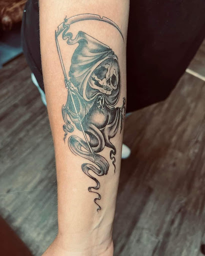 Explore ironman triathlon tattoo ideas, creative tattoo ideas in Green Cove Springs, available at Under Your Skin Tattoos