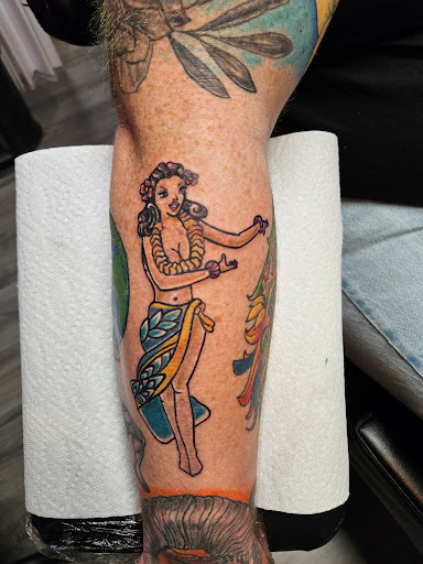 Explore thigh hip tattoo ideas, creative tattoo ideas in Cumberland, available at Queen City Ink