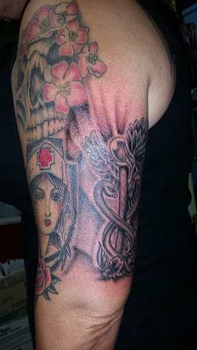 Explore cover up tattoo ideas on thigh, creative tattoo ideas in Odessa, available at Little Dragon Tattoos Studio