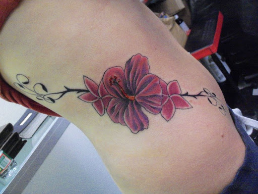 Explore penguin tattoo ideas, creative tattoo ideas in Pelham, available at Tattoo Fever