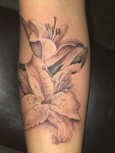 Explore tattoo full sleeve ideas, creative tattoo ideas in Savannah, available at Tatlyfe Studios