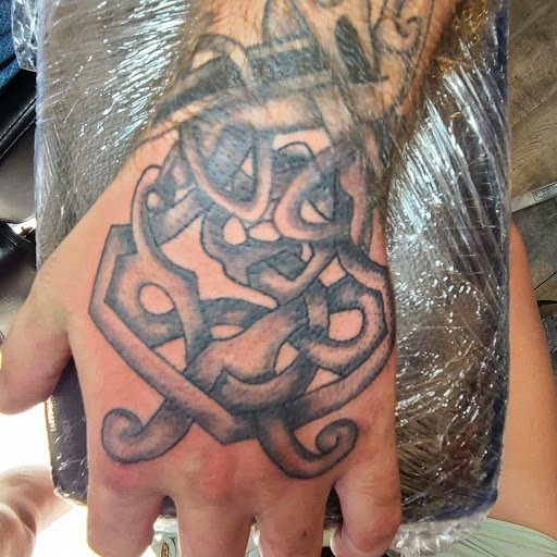 Explore tattoo over scar ideas, creative tattoo ideas in Meadville, available at Lucky Lucys Tattoo and Art Studio