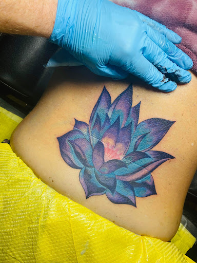 Explore bird family tattoo ideas, creative tattoo ideas in Kokomo, available at Happys Tattoo Studio