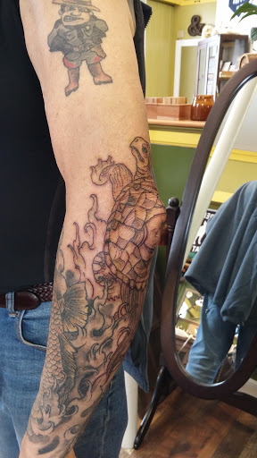 Explore tattoo cuff ideas, creative tattoo ideas in North Conway, available at Ampersand Tattoo