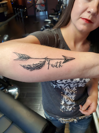 Explore statue tattoo ideas, creative tattoo ideas in Springfield, available at Kaleidoscope