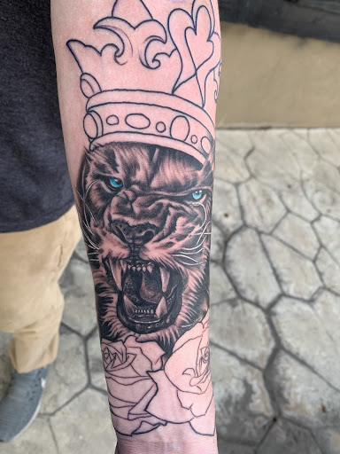 Explore hawaiian island tattoo ideas, creative tattoo ideas in Wichita, available at Addictions In Ink