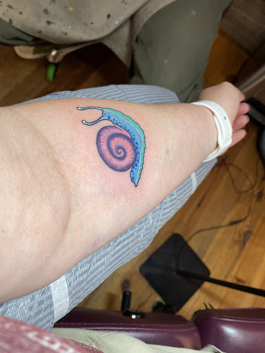 Explore peace tattoo ideas, creative tattoo ideas in Sevierville, available at Jaded Art Collective
