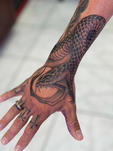 Explore vertical tattoo ideas, creative tattoo ideas in Honolulu, available at Sacred Art Tattoo Waikiki