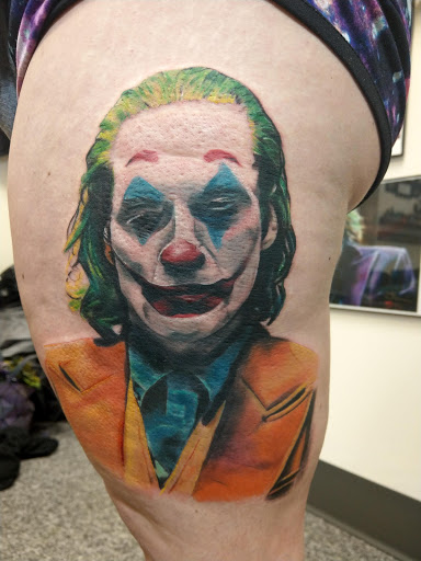 Explore red ink tattoo ideas, creative tattoo ideas in Saint Paul, available at Iron Rhino Tattoo