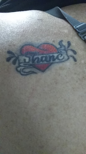 Explore daisy flower tattoo ideas, creative tattoo ideas in Calhoun, available at Immortal Tattoos