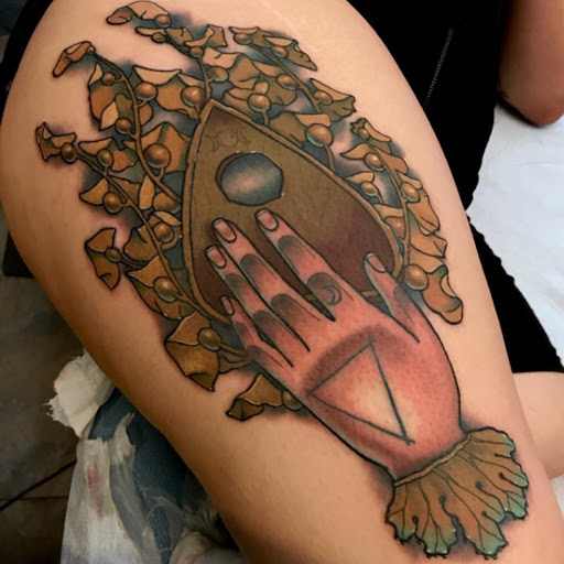 Explore red ink tattoo ideas, creative tattoo ideas in San Diego, available at Remington Tattoo Parlor