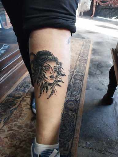 Explore tattoo cover up ideas for upper back, creative tattoo ideas in Augusta, available at Black Buffalo Tattoo