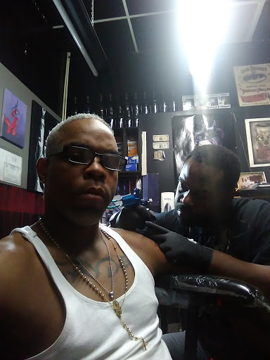 Explore back neck tattoo ideas, creative tattoo ideas in Memphis, available at Flipside Ink