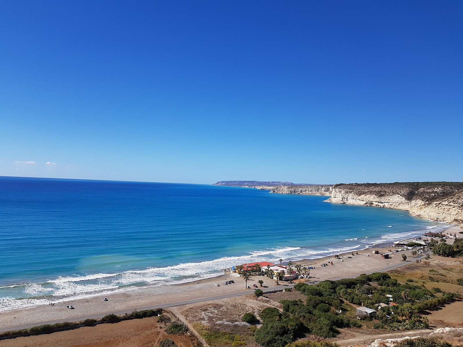 Foto von Kourion Beach mit blaues wasser Oberfläche