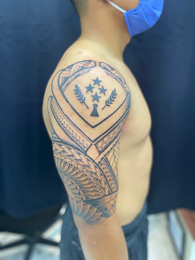 Explore chest plate tattoo ideas, creative tattoo ideas in Sparks, available at Tidal Wave Tattoo