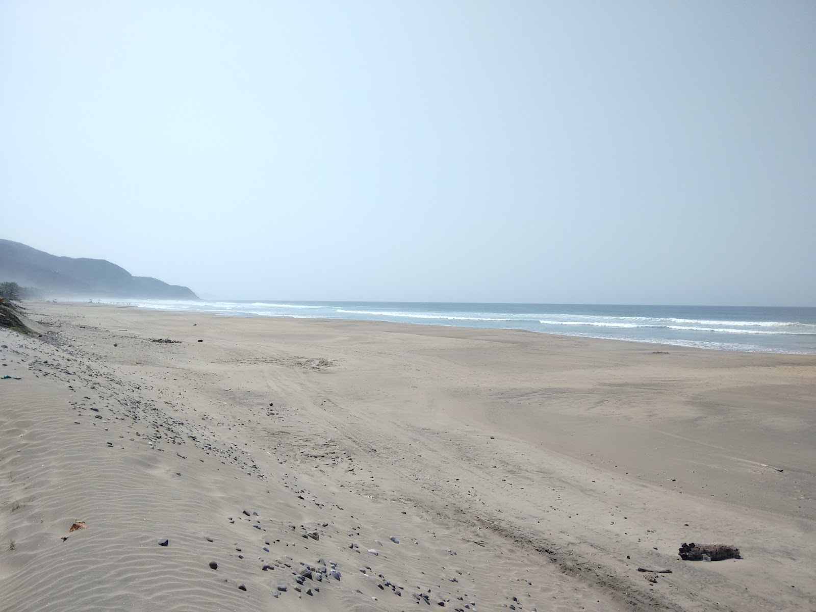 Foto de Municipio de Aquila Beach apoiado por penhascos