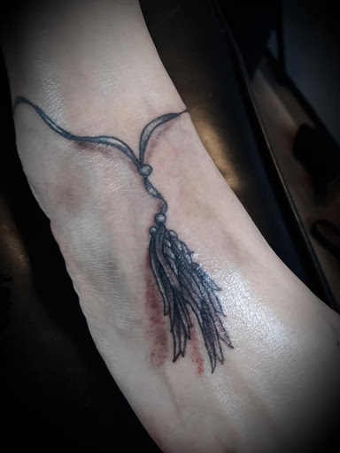 Explore first male tattoo ideas, creative tattoo ideas in Arcade, available at 98 South Tattoo and Piercing