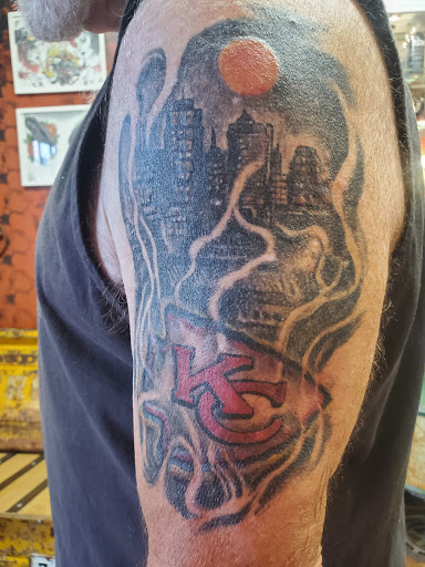 Explore flower foot tattoo ideas, creative tattoo ideas in Des Moines, available at Skin Kitchen Tattoo