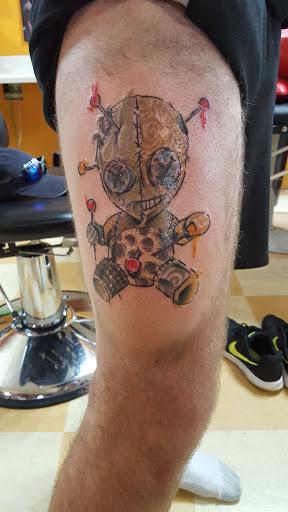 Explore skull rose tattoo ideas, creative tattoo ideas in Shreveport, available at The Body Electric