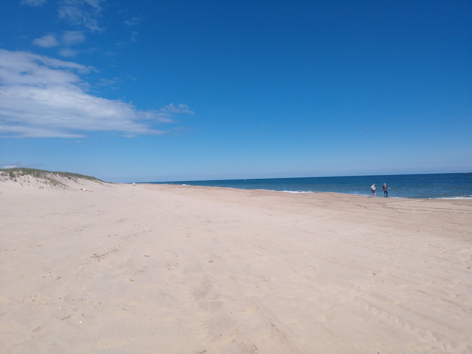 Napeague Ocean Beach的照片 带有明亮的沙子表面