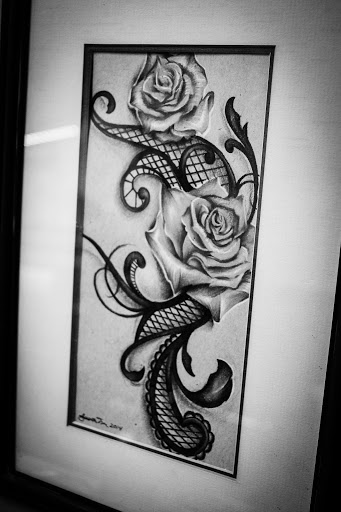 Explore mens tattoo wedding ring ideas, creative tattoo ideas in Mchenry, available at Art and Soul Tattoo Company