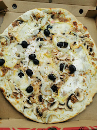 Plats et boissons du Pizzeria Pizzas Félicita à Larringes - n°1