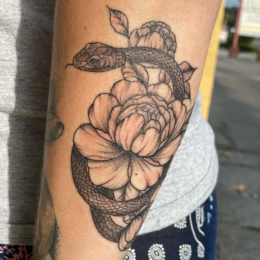 Explore infinity tattoo ideas for guys, creative tattoo ideas in Ocala, available at The Tattoo Gallery of Ocala LLC