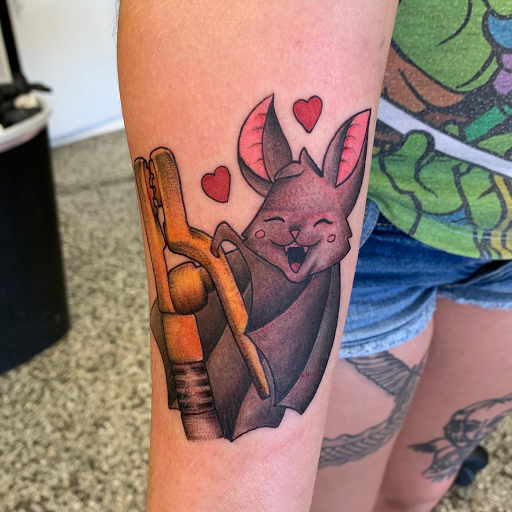 Find wave tattoo ideas for your next unique tattoo in Sanford at Luv Ink