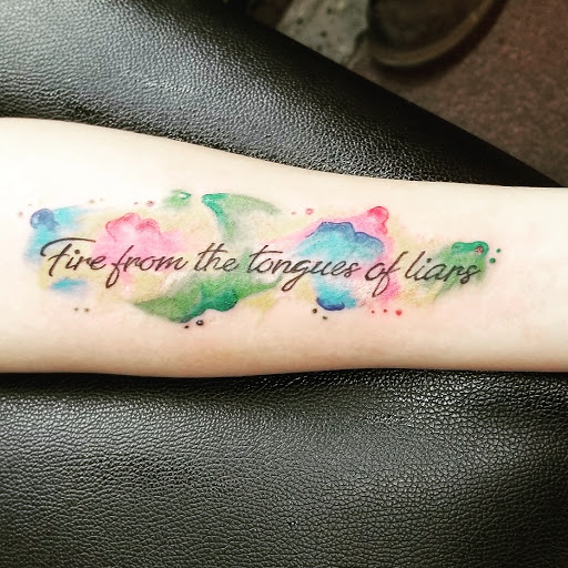 Explore snake tattoo ideas for females, creative tattoo ideas in Penn Yan, available at The Tattoo Shop