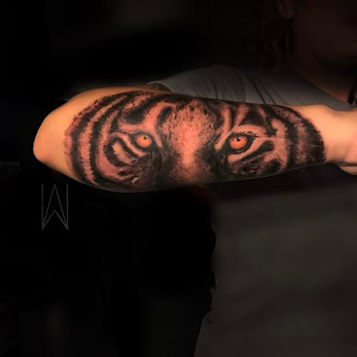 Find family tattoo ideas for moms for your next unique tattoo in Stillwater at Black Shamrock 215 Tattoo