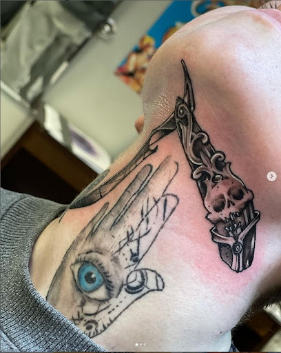 Explore dragon tattoo ideas for guys, creative tattoo ideas in Mastic, available at Infinity Tattoo