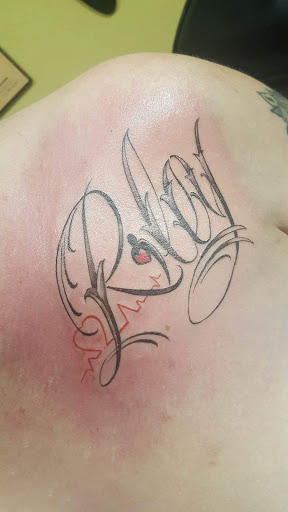 Find robot tattoo ideas for your next unique tattoo in Savannah at Tatlyfe Studios