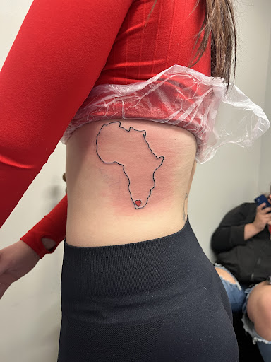 Explore men's inner bicep tattoo ideas, creative tattoo ideas in Milwaukee, available at West Allis Tattoo & Gallery Tattoo Shop Milwaukee