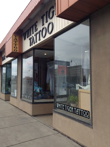 Tattoo Shop «White Tiger Tattoo», reviews and photos, 466 W Ridge Rd, Rochester, NY 14615, USA