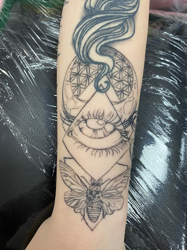 Explore ideas for spine tattoos, creative tattoo ideas in Conroe, available at Nicoles Tattoos and Piercings