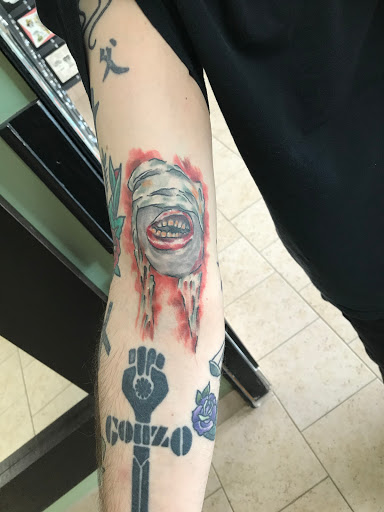 Explore small coraline tattoo ideas, creative tattoo ideas in Libertyville, available at Lucky Seven Tattoo