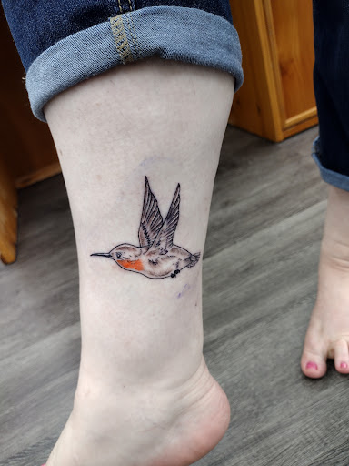 Explore joy tattoo ideas, creative tattoo ideas in Royston, available at Mad Tatter Tattoos