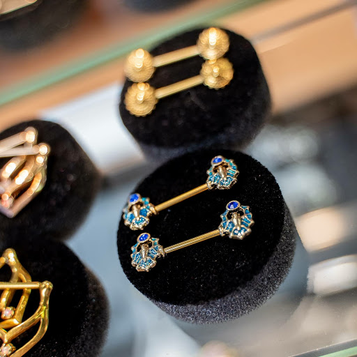 Explore side stomach tattoo ideas, creative tattoo ideas in Summerville, available at Exotic Impressions Body Piercing