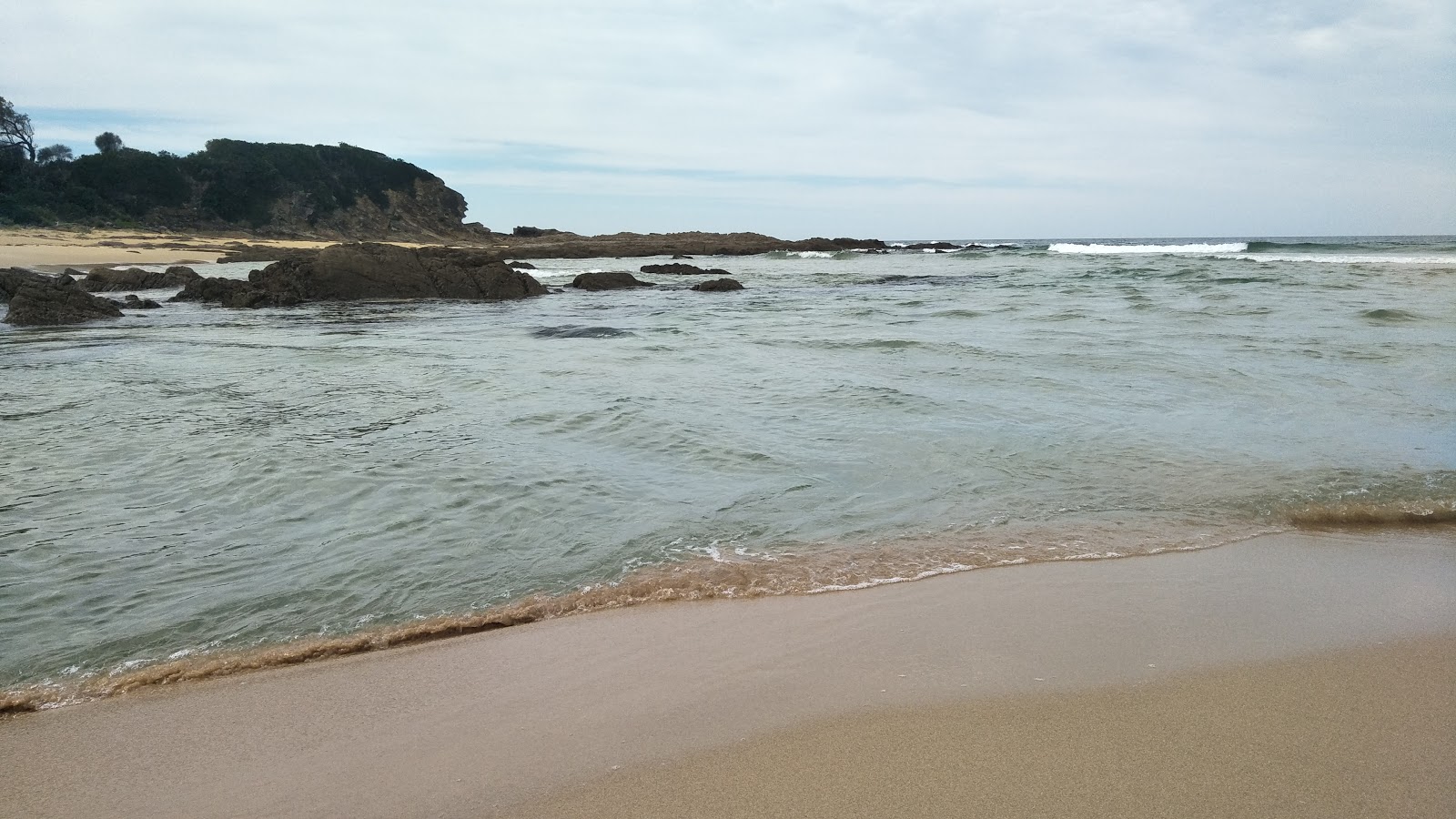 Foto di Bunga Beach con costa lunga e dritta