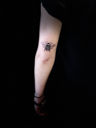 Explore ladies neck tattoo ideas, creative tattoo ideas in High Ridge, available at Taylored ink