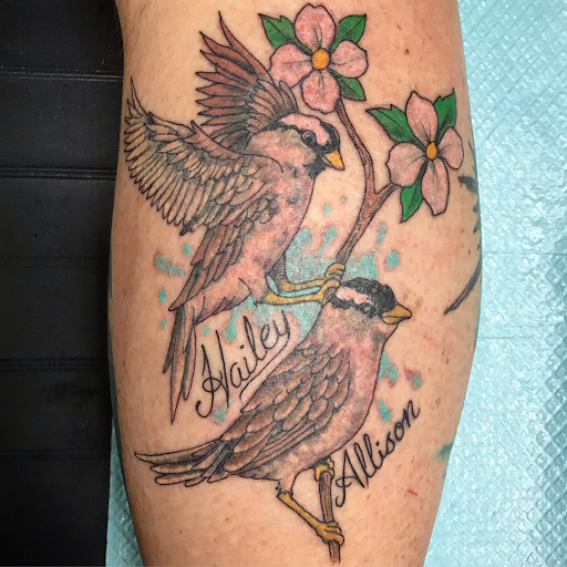 Explore fighting rooster tattoo ideas, creative tattoo ideas in Louisburg, available at Lewter Tattoos and Piercing