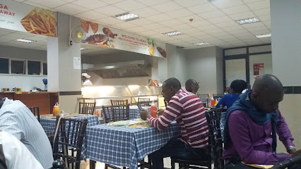 Mega Restaurant & TakeAway - 8H6G+78C, Buxton Rd, Kampala, Uganda
