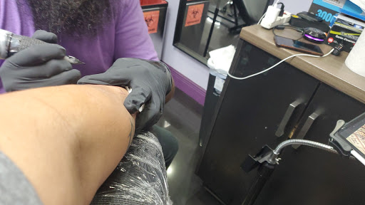 Tattoo Shop «Salvation Tattoo Lounge», reviews and photos, 1302 N University Dr, Coral Springs, FL 33071, USA