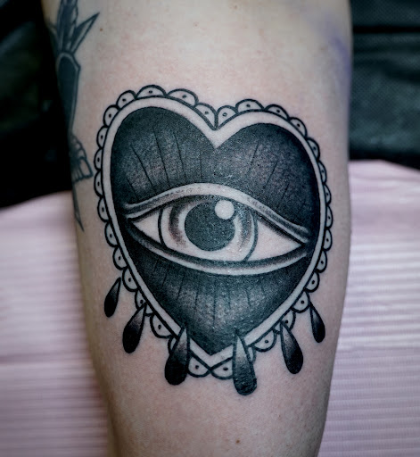 Explore bear sleeve tattoo ideas, creative tattoo ideas in Arlington, available at Benchmark Tattoos