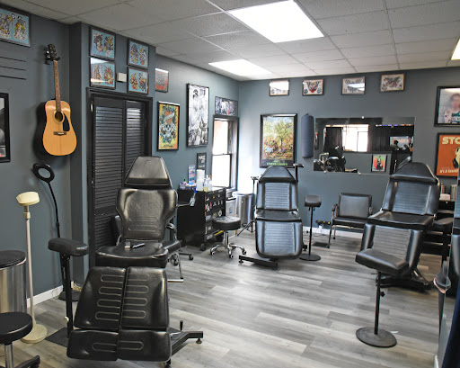 Explore alpha tattoo ideas, creative tattoo ideas in Kalamazoo, available at SouthPointe Ink - Tattoos and Piercings