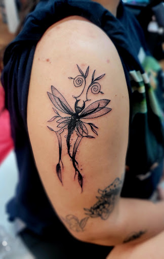 Explore face tattoo ideas black male, creative tattoo ideas in Benton, available at Spectrum Tattoo